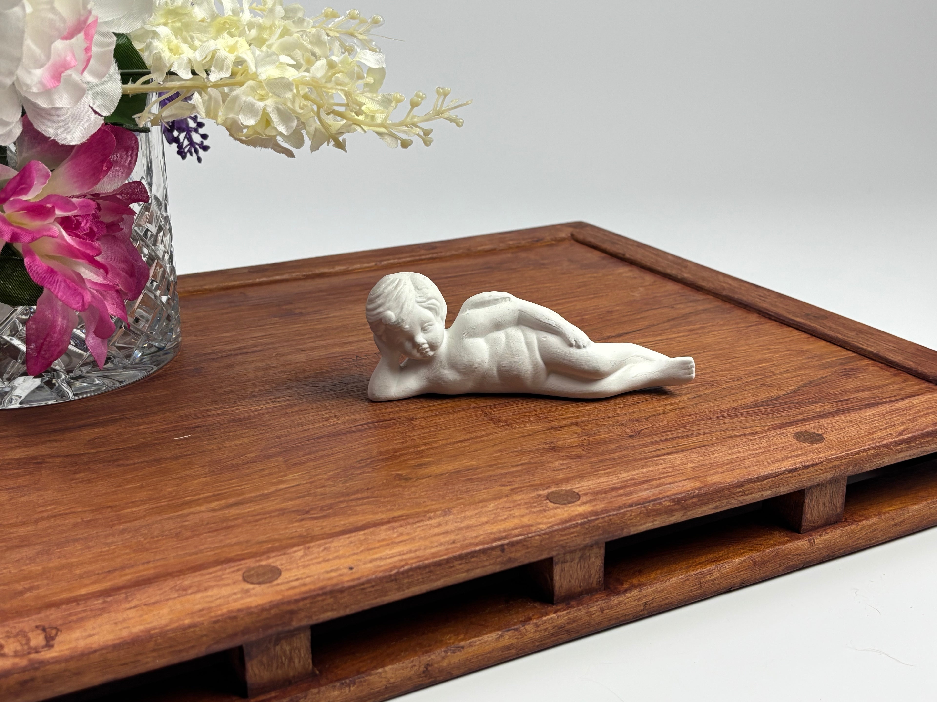 Ceramic Reclining Boy Figurine — 5.4″ Long × 2″ Tall