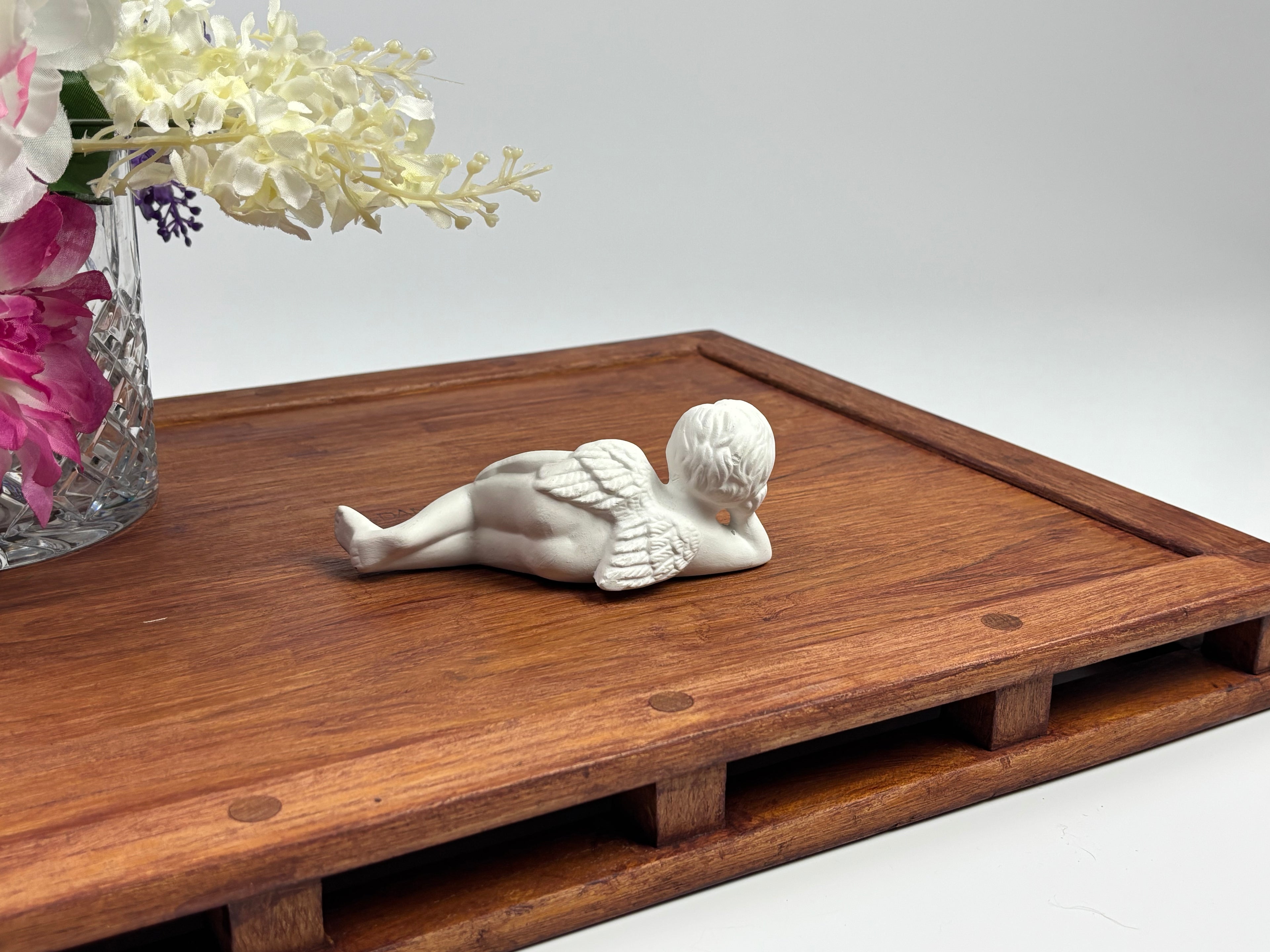 Ceramic Reclining Boy Figurine — 5.4″ Long × 2″ Tall